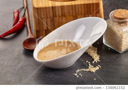 Asian sesame sauce with seeds Asian sesame sauce with seeds 138062152
