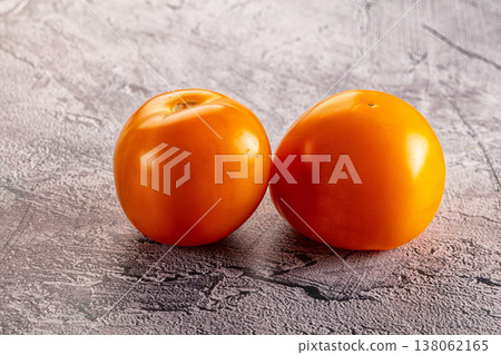 Ripe raw yellow tomato heap 138062165