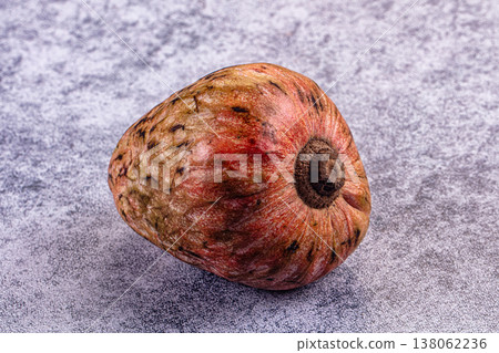 Exotic cherimoya fruit on a wooden table background Exotic cherimoya fruit on a wooden table background 138062236
