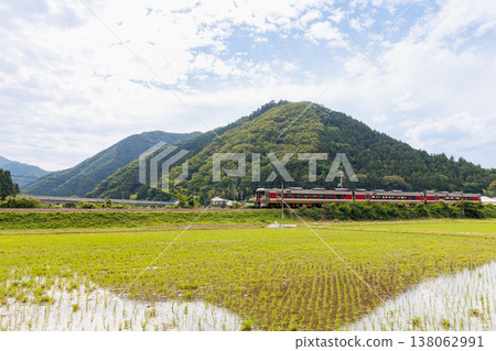 A limited express train on the Bantan Line and rural scenery (Asago City, Hyogo Prefecture) A limited express train on the Bantan Line and rural scenery (Asago City, Hyogo Prefecture) 138062991