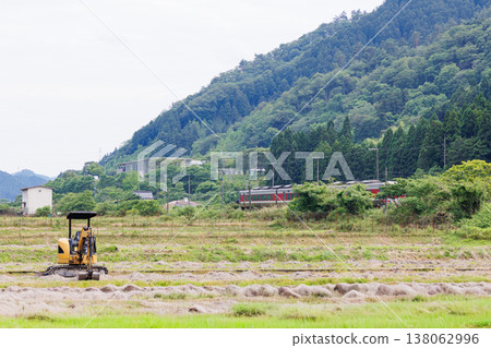 A limited express train on the Bantan Line and rural scenery (Asago City, Hyogo Prefecture) 138062996