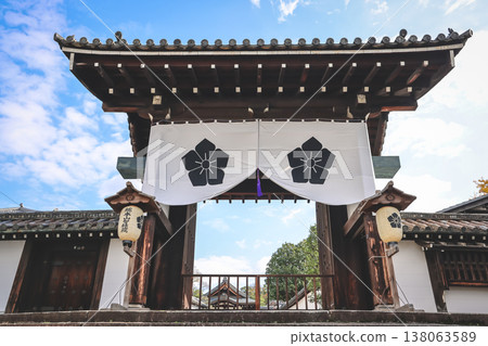 Traditional Japanese Temple Gate With White Noren And Stone Steps Nov 28 2025 138063589