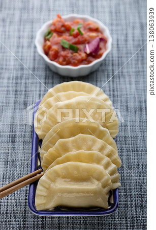 Boiled Dumplings with Fresh Tomato Salsa and Chopsticks Boiled Dumplings with Fresh Tomato Salsa and Chopsticks 138063939