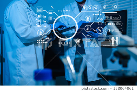 Scientists conducting research in a biotechnology lab. Innovation in chemistry, healthcare, and medicine. Scientists conducting research in a biotechnology lab. Innovation in chemistry, healthcare, and medicine. 138064061