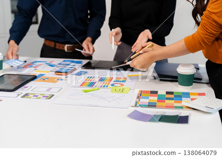 UX developer and ui designer brainstorming about mobile app interface wireframe design with customer breif and color code, User experience concept. UX developer and ui designer brainstorming about mobile app interface wireframe design with customer breif and color code, User experience concept. 138064079