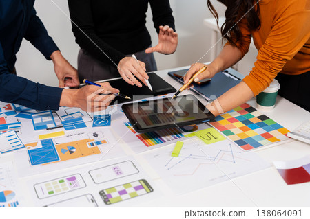 UX developer and ui designer brainstorming about mobile app interface wireframe design with customer breif and color code, User experience concept. UX developer and ui designer brainstorming about mobile app interface wireframe design with customer breif and color code, User experience concept. 138064091