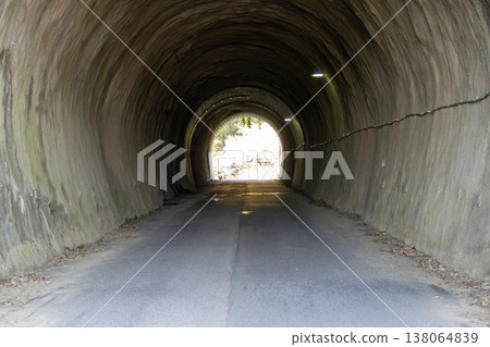 A bright spring landscape beyond the tunnel A bright spring landscape beyond the tunnel 138064839