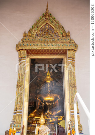 Golden Buddha framed doorway 138066308
