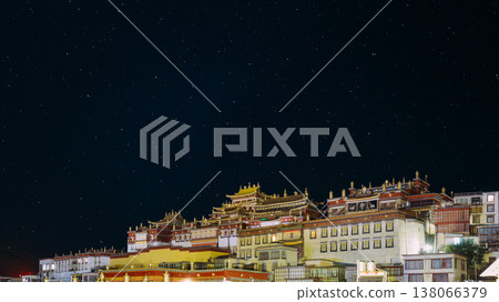 Starry night sky above Songzanlin Monastery in Shangri La. China Starry night sky above Songzanlin Monastery in Shangri La. China 138066379
