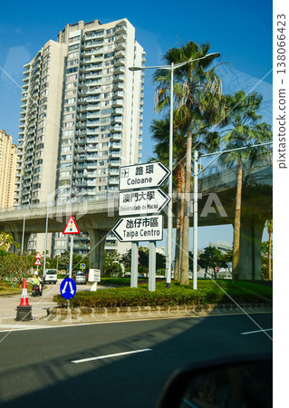 Bilingual Chinese Portuguese directional road signs for Cotai Taipa Centro and University of Macau on highway Bilingual Chinese Portuguese directional road signs for Cotai Taipa Centro and University of Macau on highway 138066423