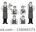 A male cafe staff member wearing an apron. 138066573