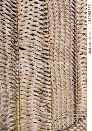 woven mats of dried coconut leaves woven mats of dried coconut leaves 138068778