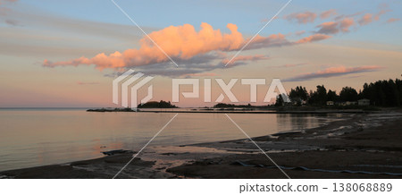 Bright lit cloud over Lake Vanern, Sweden. 138068889