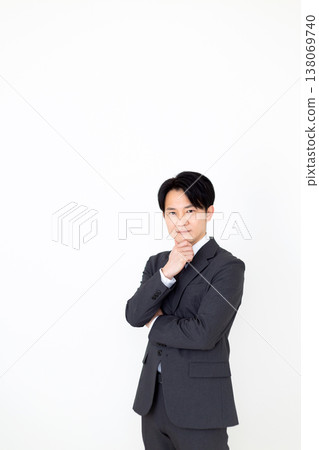 Middle-aged male businessman in a suit Middle-aged male businessman in a suit 138069740