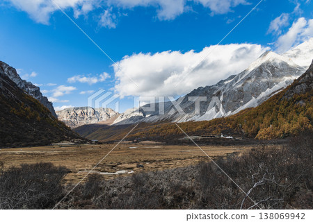 The last Shangri La, view of autumn highland snow mountain of Yading Nature Reserve, snow-capped mountains, crystal clear lakes, vast grasslands, colorful forests, Shangri-La Town, Daocheng, Sichuan, 138069942