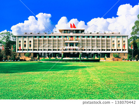 A composite image of the Reunification Palace (former Presidential Palace) in Ho Chi Minh City and cumulonimbus clouds. A composite image of the Reunification Palace (former Presidential Palace) in Ho Chi Minh City and cumulonimbus clouds. 138070442