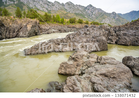 Narrowest and deepest section of Katun river with lava banks in Altai Russia. View from rocky gorge. 138071432