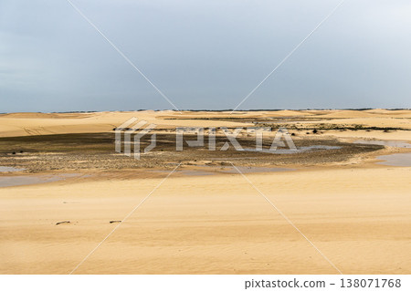 Dunes and lagoons of Atins, Lencois Maranhenses, Barreirinhas, Brazil. White sand dunes with pools of fresh water Dunes and lagoons of Atins, Lencois Maranhenses, Barreirinhas, Brazil. White sand dunes with pools of fresh water 138071768
