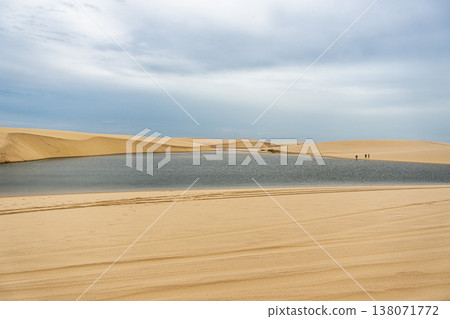 Dunes and lagoons of Atins, Lencois Maranhenses, Barreirinhas, Brazil. White sand dunes with pools of fresh water Dunes and lagoons of Atins, Lencois Maranhenses, Barreirinhas, Brazil. White sand dunes with pools of fresh water 138071772