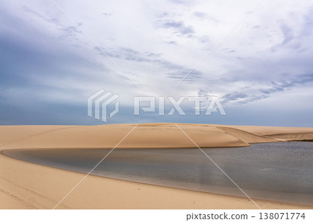 Dunes and lagoons of Atins, Lencois Maranhenses, Barreirinhas, Brazil. White sand dunes with pools of fresh water 138071774