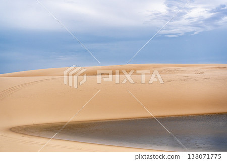 Dunes and lagoons of Atins, Lencois Maranhenses, Barreirinhas, Brazil. White sand dunes with pools of fresh water 138071775