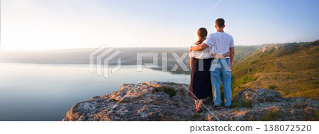 Girl and guy on the hill Girl and guy on the hill 138072520