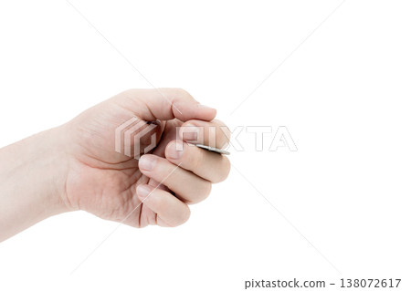 A man's hand is juggling a coin. 138072617