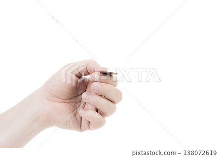 A man's hand is juggling a coin. A man's hand is juggling a coin. 138072619