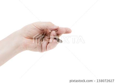 A man's hand is juggling a coin. A man's hand is juggling a coin. 138072627