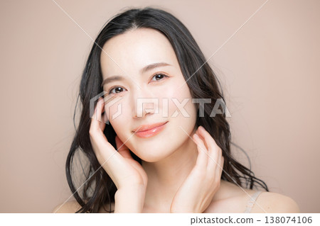 Skincare products, glowing skin, moisturizing, and luxurious beauty images with direct eye contact with the camera. Skincare products, glowing skin, moisturizing, and luxurious beauty images with direct eye contact with the camera. 138074106
