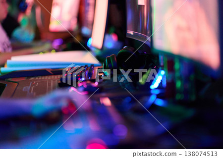 Colorful RGB PC Gaming Setup With Mechanical Keyboard And Headset At Nighttime LAN Party Colorful RGB PC Gaming Setup With Mechanical Keyboard And Headset At Nighttime LAN Party 138074513