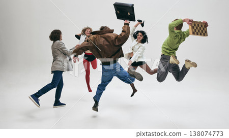 People in conflict jumping and throwing items in chaotic scene isolated background. 138074773