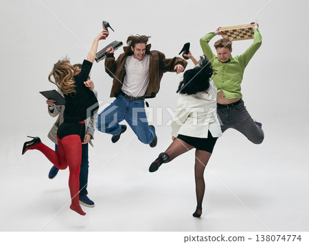 Group of people jumping and throwing objects in chaotic aggressive interaction isolated on white. Group of people jumping and throwing objects in chaotic aggressive interaction isolated on white. 138074774