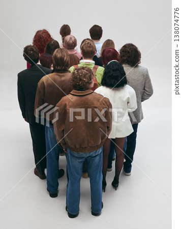 People crowd standing close together from behind in tight arrangement isolated background People crowd standing close together from behind in tight arrangement isolated background 138074776