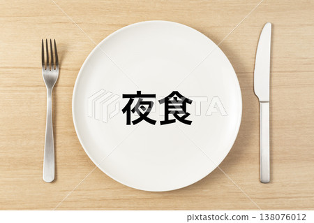 A plate and cutlery labeled "Late-night snack" 138076012