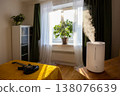 Humidifier spreading steam in a bedroom. 138076639