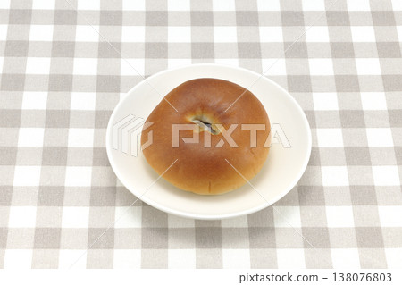 Anpan (sweet bean paste bun) with salted cherry blossoms inside Anpan (sweet bean paste bun) with salted cherry blossoms inside 138076803