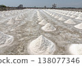 Salt fields in Phetchaburi Province, Thailand, where salt is harvested from seawater using traditional methods. 138077346