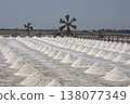 Salt fields in Phetchaburi Province, Thailand, where salt is harvested from seawater using traditional methods. 138077349