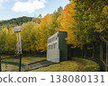 A deserted baseball field and scoreboard bathed in autumn colors. 138080131