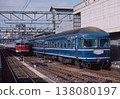 Nara Station during the JNR (Japanese National Railways) era: DD51 1041 pulling a 20 series passenger train and a 113 series train in Kansai Line livery side-by-side. *Probably the "Tenri Special Train". 138080197