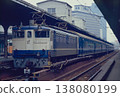 The express train Chikuma (a mixed formation of 20 series and 12 series cars) stopped at Osaka Station during the final years of Japanese National Railways, pulled by EF65 1113. 138080199