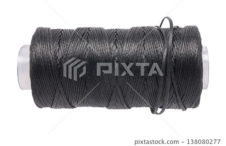 spool of colored thread on a white isolated background 138080277