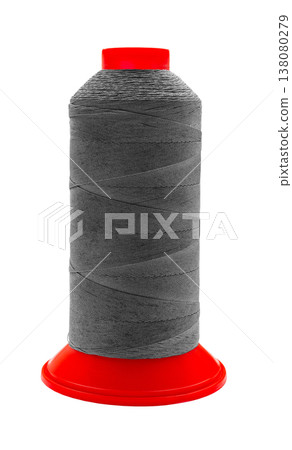spool of colored thread on a white isolated background 138080279