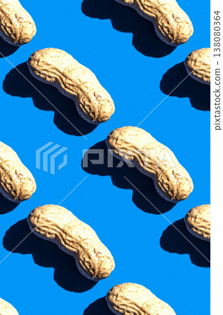 Peanut pattern on blue background, top view colorful food flat lay texture Peanut pattern on blue background, top view colorful food flat lay texture 138080364