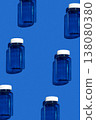Medicine jar pattern on blue background, pharmaceutical flat lay texture top view 138080380