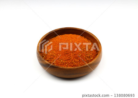 Cajun seasoning in a wooden bowl isolated on white background 138080693