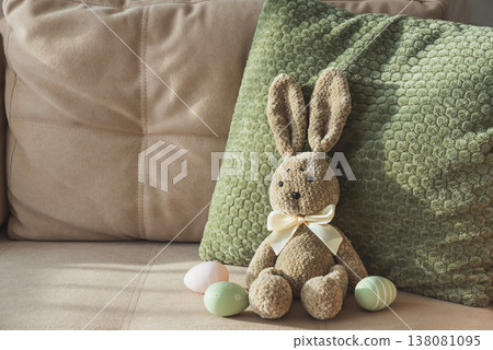 Plush Bunny with Easter Eggs. Cozy Easter Decoration Plush Bunny with Easter Eggs. Cozy Easter Decoration 138081095