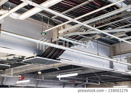 Multi-story parking garage, electrical cable rack 138081276