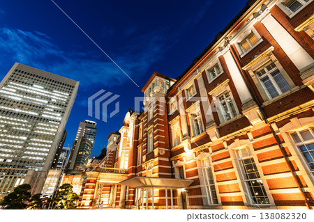 Night view of the Tokyo Station. It's a major inter-city rail terminal in Chiyoda, Tokyo, Japan. located in the Marunouchi business district. Night view of the Tokyo Station. It's a major inter-city rail terminal in Chiyoda, Tokyo, Japan. located in the Marunouchi business district. 138082320